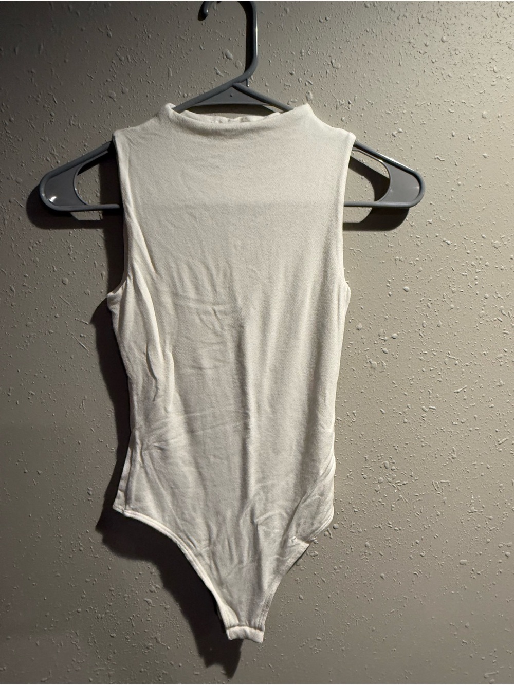 Women’s White Sleeveless Mock Neck Bodysuit